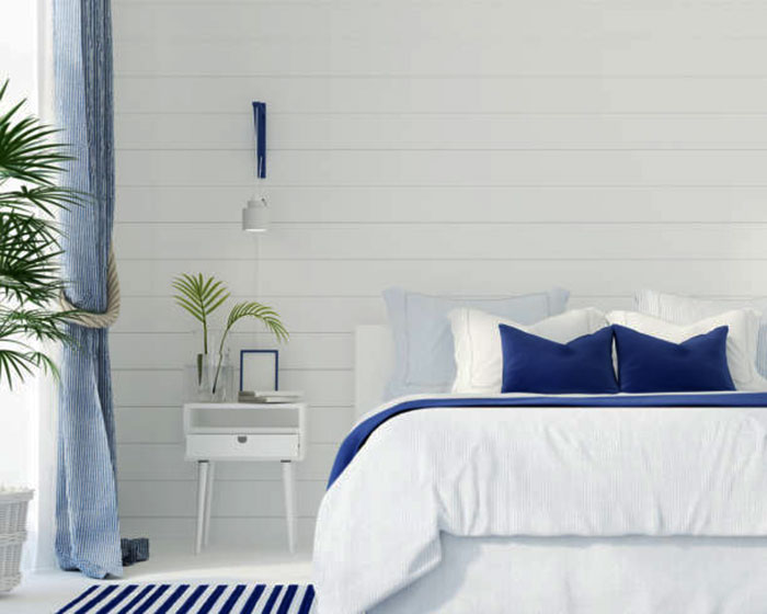 спальня в сине белом цвете