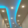 Освещение прихожей точечными светильниками, подсветка ниш потолка RGB лентой.